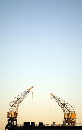 simsearch:400-04805936,k - Two powerful cranes in a dockyard Photographie de stock - Aubaine LD & Abonnement, Code: 400-04740662