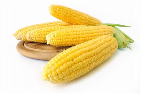 simsearch:400-04360453,k - Fresh corn cobs closeup on white background Stock Photo - Budget Royalty-Free & Subscription, Code: 400-04740793
