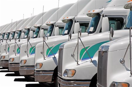 fleet - Semi truck fleet lined up in a row Stock Photo - Budget Royalty-Free & Subscription, Code: 400-04741078