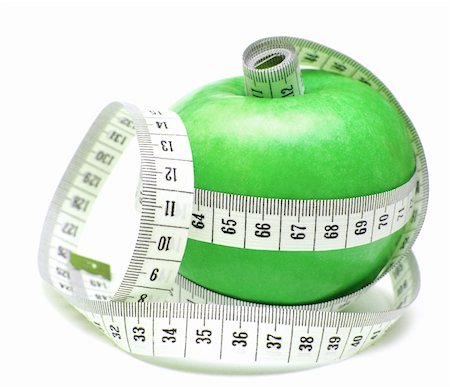 simsearch:400-04105649,k - tape measure wrapped around green apple isolate on white Foto de stock - Super Valor sin royalties y Suscripción, Código: 400-04741430