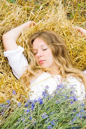 fastof (artist) - woman sleeps in the summer on straw and nearby the bunch of flowers lays Stock Photo - Budget Royalty-Free & Subscription, Code: 400-04741702