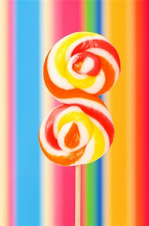 simsearch:400-07449438,k - Colourful lollipop against the colourful background Stock Photo - Budget Royalty-Free & Subscription, Code: 400-04742136