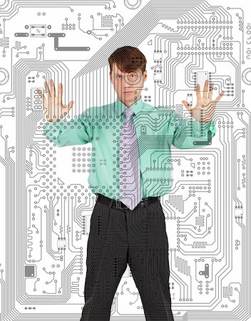 A man held captive by the electronics Stock Photo - Budget Royalty-Free & Subscription, Code: 400-04742361