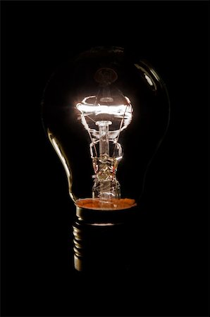 simsearch:400-04901392,k - An illuminated light bulb on a black background Stock Photo - Budget Royalty-Free & Subscription, Code: 400-04742680