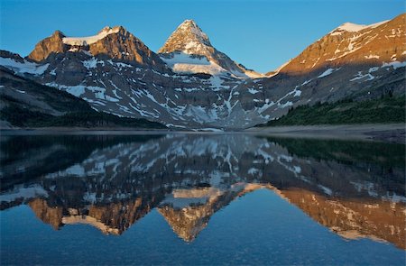 skylight (artist) - Mount Assiniboine reflected in Lake Magog in Mt.Assiniboine Provincial Park in British Columbia, Canada Stock Photo - Budget Royalty-Free & Subscription, Code: 400-04742947