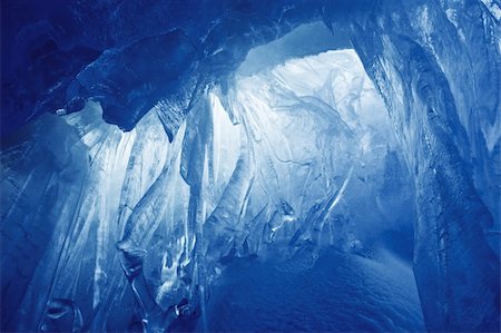 stalagmite - blue ice cave covered with snow and flooded with light Stock Photo - Budget Royalty-Free & Subscription, Code: 400-04754185