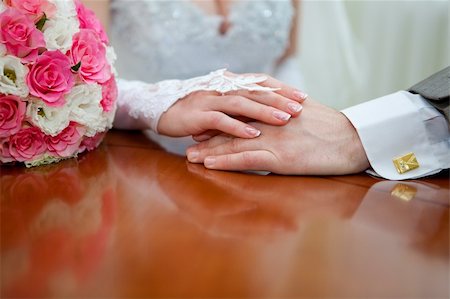 simsearch:400-04161971,k - Hands of the groom and the bride Stock Photo - Budget Royalty-Free & Subscription, Code: 400-04754423