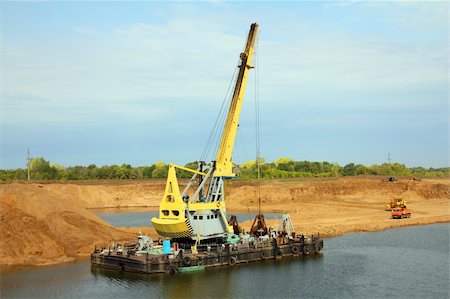 simsearch:400-04262573,k - floating excavator - development sandpit with dredge Stock Photo - Budget Royalty-Free & Subscription, Code: 400-04754675