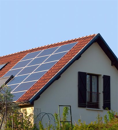 raphtong (artist) - solar or photovoltaic panels on a roof Fotografie stock - Microstock e Abbonamento, Codice: 400-04754815