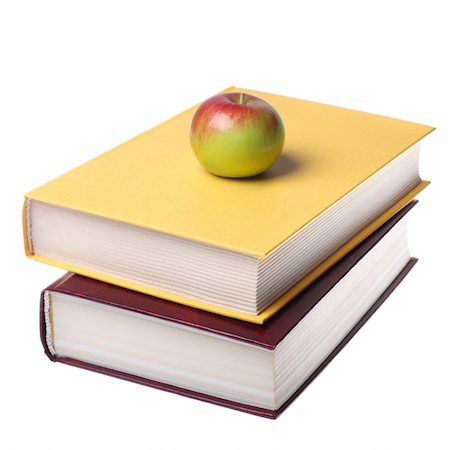 simsearch:400-05734056,k - Stack of books with apple isolated on white background Photographie de stock - Aubaine LD & Abonnement, Code: 400-04754858