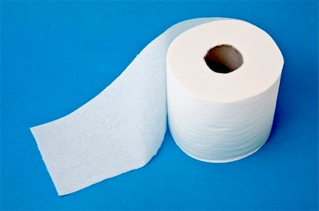 educazione all'uso del vaso - Modern Toilet Paper Concept Image on a Blue Background. Fotografie stock - Microstock e Abbonamento, Codice: 400-04755463