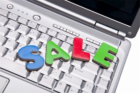 simsearch:400-04231102,k - The Word Sale on A Laptop for Internet E-Commcece Sale Concepts. Photographie de stock - Aubaine LD & Abonnement, Code: 400-04755472