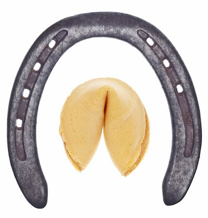 ferradura - Lucky Horse and Fortune Cookie Shoe Isolated on White with a Clipping Path. Foto de stock - Royalty-Free Super Valor e Assinatura, Número: 400-04755735