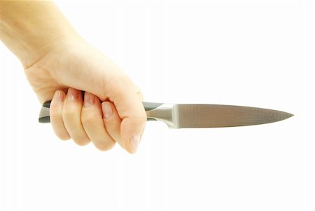 simsearch:400-07779478,k - Knife in a hand isolated on white Stock Photo - Budget Royalty-Free & Subscription, Code: 400-04755808