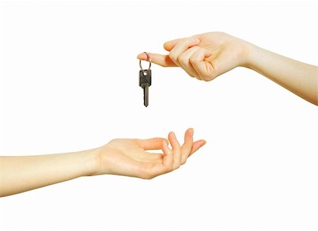 simsearch:400-04350998,k - hand holds a key isolated on white Stock Photo - Budget Royalty-Free & Subscription, Code: 400-04755809