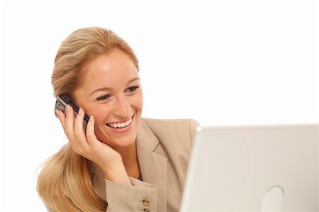 simsearch:400-05732500,k - Portrait of young business girl using cell phone at desk with laptop Foto de stock - Royalty-Free Super Valor e Assinatura, Número: 400-04756171