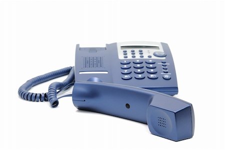 simsearch:400-03989083,k - Modern blue business office telephone isolated on a white background. Photographie de stock - Aubaine LD & Abonnement, Code: 400-04756496