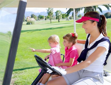 golf course family mother and daughters in buggy green grass field Stock Photo - Budget Royalty-Free & Subscription, Code: 400-04756748