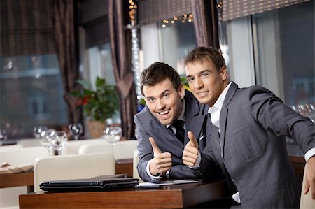 simsearch:400-04322314,k - Two joyful businessmen at restaurant celebrate the transaction Stock Photo - Budget Royalty-Free & Subscription, Code: 400-04756916