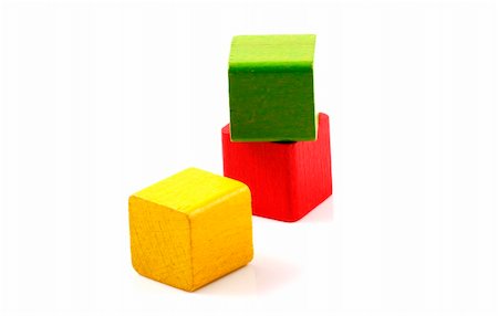 Wooden building blocks on white background Stock Photo - Budget Royalty-Free & Subscription, Code: 400-04757116