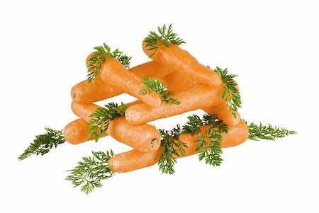 simsearch:400-07982459,k - Carrots stacket up with leaves around on white background Photographie de stock - Aubaine LD & Abonnement, Code: 400-04757367