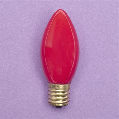 red christmas bulbs - Holiday Light on a Simple Purple Background.  Everyday Object. Stock Photo - Budget Royalty-Free & Subscription, Code: 400-04757432