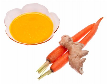 simsearch:400-05308926,k - Ginger and carrot soup with ginger and carrot garnish.  isolted on white with a clipping path. Photographie de stock - Aubaine LD & Abonnement, Code: 400-04757648