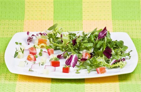 simsearch:400-04879197,k - Various salad leaves with tomato, radish and cucumber Stock Photo - Budget Royalty-Free & Subscription, Code: 400-04758116