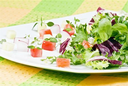 simsearch:400-04879197,k - Various salad leaves with tomato, radish and cucumber Stock Photo - Budget Royalty-Free & Subscription, Code: 400-04758117