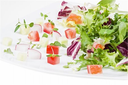 simsearch:400-04879197,k - Various salad leaves with tomato, radish and cucumber Stock Photo - Budget Royalty-Free & Subscription, Code: 400-04758118