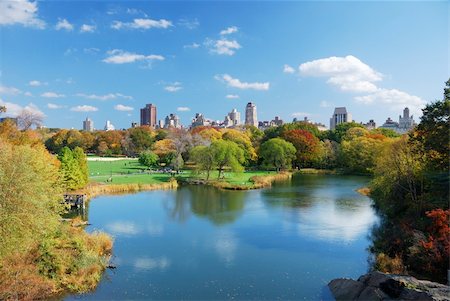 New York City Central Park in Autumn with Manhattan skyscrapers and colorful trees over lake with reflection. Stock Photo - Budget Royalty-Free & Subscription, Code: 400-04758253