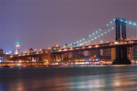 simsearch:400-04993958,k - New York City night scene with Manhattan bridge and Empire State. Manhattan bridge connects new york and Brooklyn. Photographie de stock - Aubaine LD & Abonnement, Code: 400-04758282