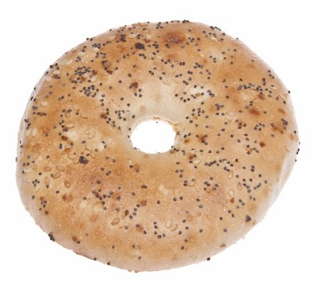 simsearch:400-05308926,k - Toasted everything bagel with a variety of seeds and flavors.  Isolated on white with a clipping path. Photographie de stock - Aubaine LD & Abonnement, Code: 400-04758523