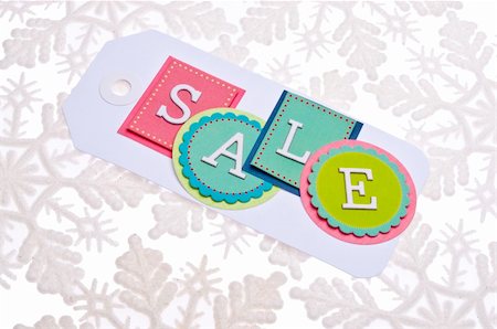simsearch:400-04231102,k - Holiday Sale Tag on a Snowflake Background. Photographie de stock - Aubaine LD & Abonnement, Code: 400-04758923