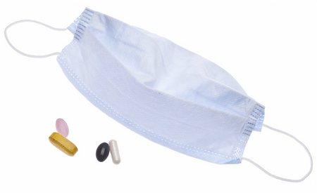 Surgical Mask and Pills Isolated on White with a Clipping Path. Stock Photo - Budget Royalty-Free & Subscription, Code: 400-04758973