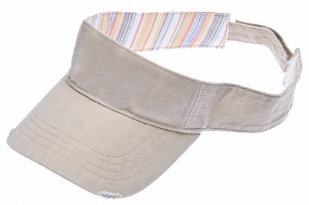 sun visor hat - Sun Visor isolated on white with a clipping path.  Perfect for the beach of a game of golf. Photographie de stock - Aubaine LD & Abonnement, Code: 400-04759321
