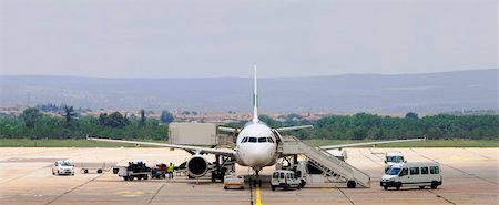 plane runway people - maintenance of aircraft at the airport in Varna, Bulgaria Stock Photo - Budget Royalty-Free & Subscription, Code: 400-04759354