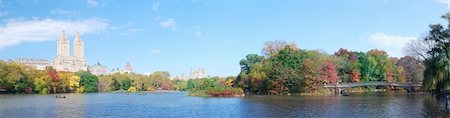 New York City Central Park panorama view in Autumn with Manhattan skyscrapers and colorful trees with Rainbow Bridge over lake with reflection. Stock Photo - Budget Royalty-Free & Subscription, Code: 400-04759448
