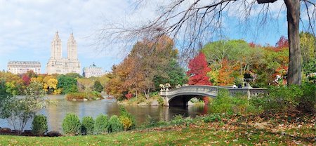 New York City Central Park panorama view in Autumn with Manhattan skyscrapers and colorful trees with Rainbow Bridge over lake with reflection. Stock Photo - Budget Royalty-Free & Subscription, Code: 400-04759449