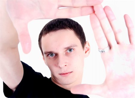 simsearch:649-06000756,k - Portrait of a young man showing framing hand gesture Stock Photo - Budget Royalty-Free & Subscription, Code: 400-04759623