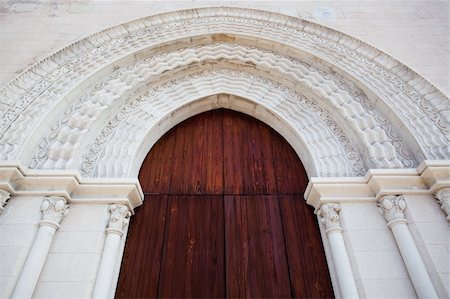 Old solid wood door in the church on Sicily Stock Photo - Budget Royalty-Free & Subscription, Code: 400-04750013