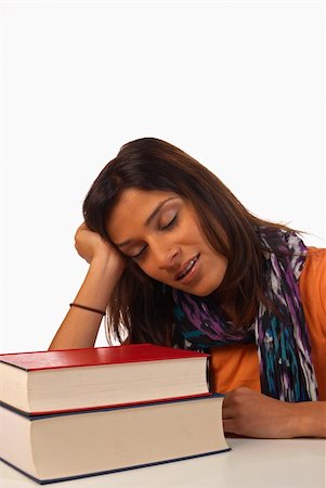 pakistani student - Middle eastern student in an uninterested attitude towards her books Stock Photo - Budget Royalty-Free & Subscription, Code: 400-04750384