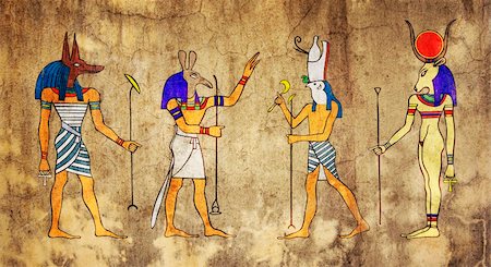 Various Egyptian Gods and Goddess.  Left to right: Anubis, Seth, Horus and Hathor.  Anubis - Yinepu - dog or jackal god of embalming and tomb-caretaker who watches over the dead - associated with mummification and the afterlife in Egyptian mythology.    Set - Seth - god of storms, later became god of evil, darkness, chaos and desert and patron of Upper Egypt.    Horus - Heru - the falcon-headed go Stock Photo - Budget Royalty-Free & Subscription, Code: 400-04750482