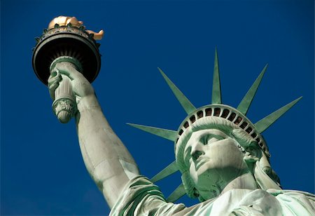 Statue of Liberty on Liberty Island in New York City Photographie de stock - Aubaine LD & Abonnement, Code: 400-04750632