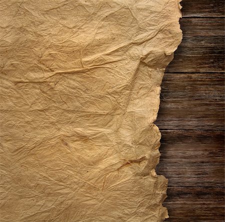 scrolled up paper - Closeup of  wrinkled parchment paper Stock Photo - Budget Royalty-Free & Subscription, Code: 400-04750682