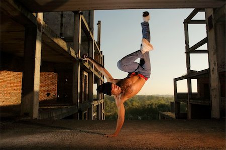 hip-hop dancer flying in dance trick Stock Photo - Budget Royalty-Free & Subscription, Code: 400-04750860