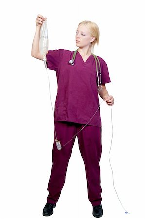 simsearch:400-05111054,k - A beautiful young female doctor holding an IV bag Foto de stock - Super Valor sin royalties y Suscripción, Código: 400-04750983