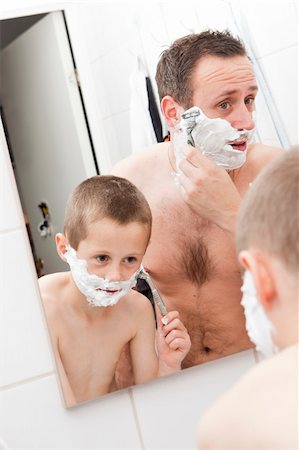 father and son and shave - Happy Mature Man shaving in bathroom with his son Stock Photo - Budget Royalty-Free & Subscription, Code: 400-04751018