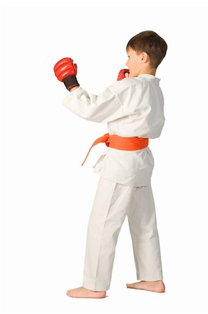 simsearch:400-06860112,k - A young boy aikido fighter in white kimono Stock Photo - Budget Royalty-Free & Subscription, Code: 400-04751061