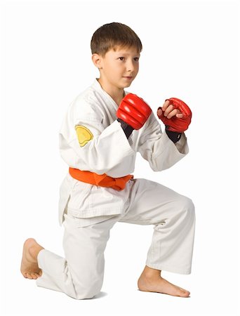 simsearch:400-06860112,k - aikido boy  A young boy aikido fighter in white kimono Stock Photo - Budget Royalty-Free & Subscription, Code: 400-04751088